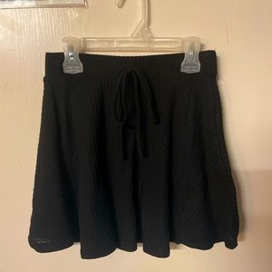 Simple black cotton skirt.